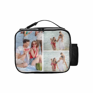 May include: A black lunch bag with a zipper closure and a mesh side pocket. The bag is decorated with a collage of four photos of a family at the beach.