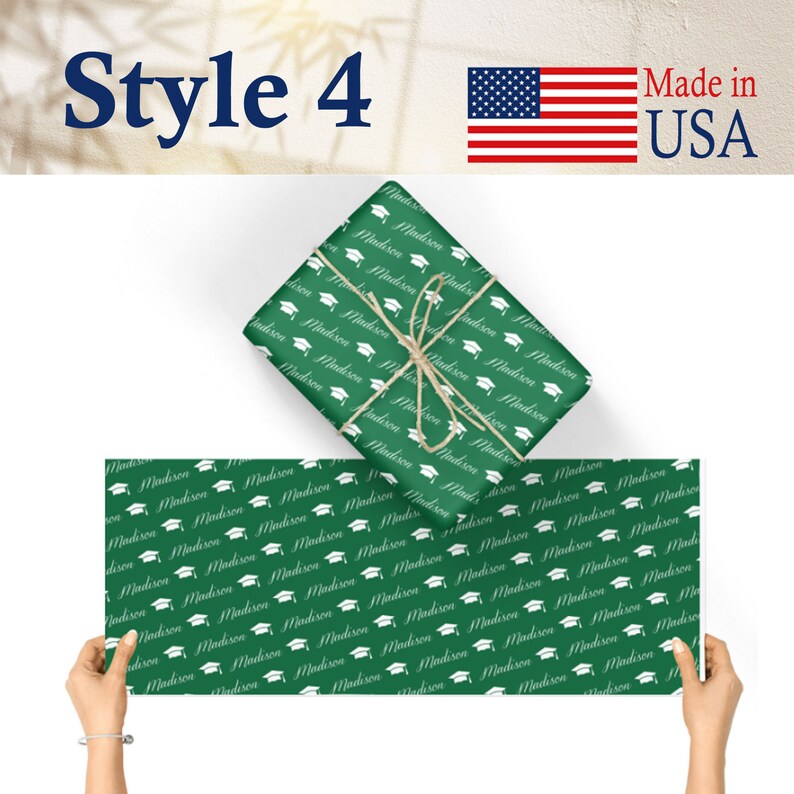 May include: Green wrapping paper with a white graduation cap and the name "Madison" repeated throughout the design. The paper is shown wrapped around a gift box and laid flat.