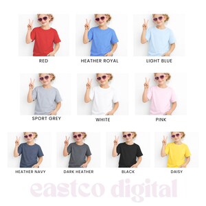 May include: A collection of children's t-shirts in various colors, including red, blue, gray, white, pink, navy, dark gray, black, and yellow. Each shirt is displayed on a child model, with the color name labeled below.