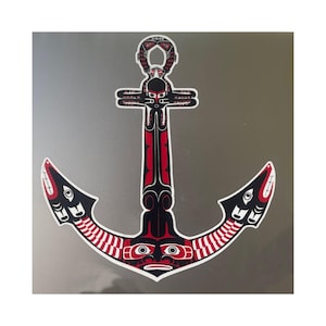 May include: A red, black, and white anchor with a stylized design inspired by Northwest Coast Indigenous art. The anchor is a traditional symbol of hope and stability.