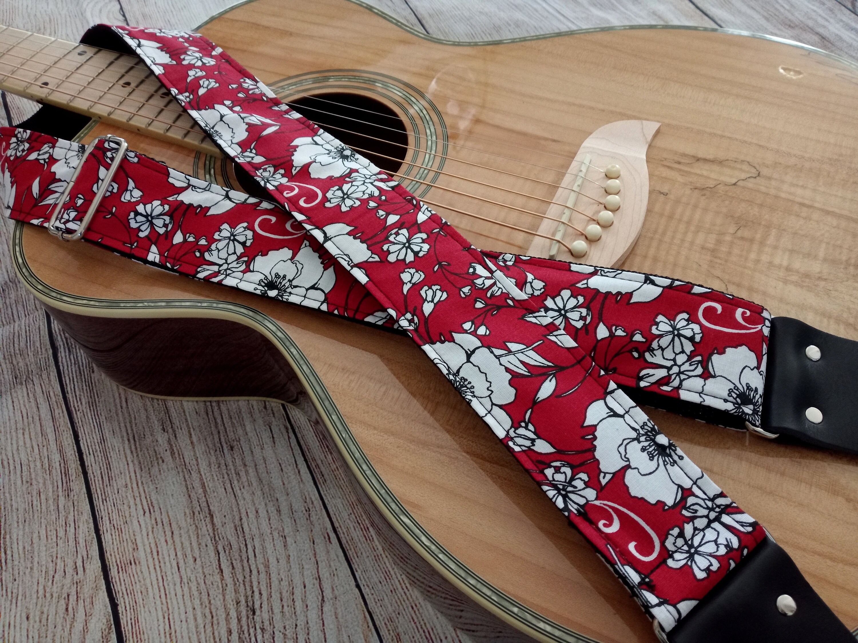 red and black guitar strap