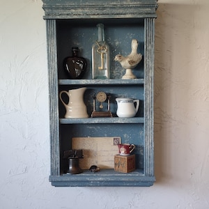 Classical wall shelf made with a Victorian era look from the 19th century.