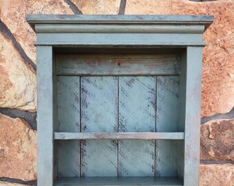 Rustic country farmhouse style wall shelf made to look like an old antique.