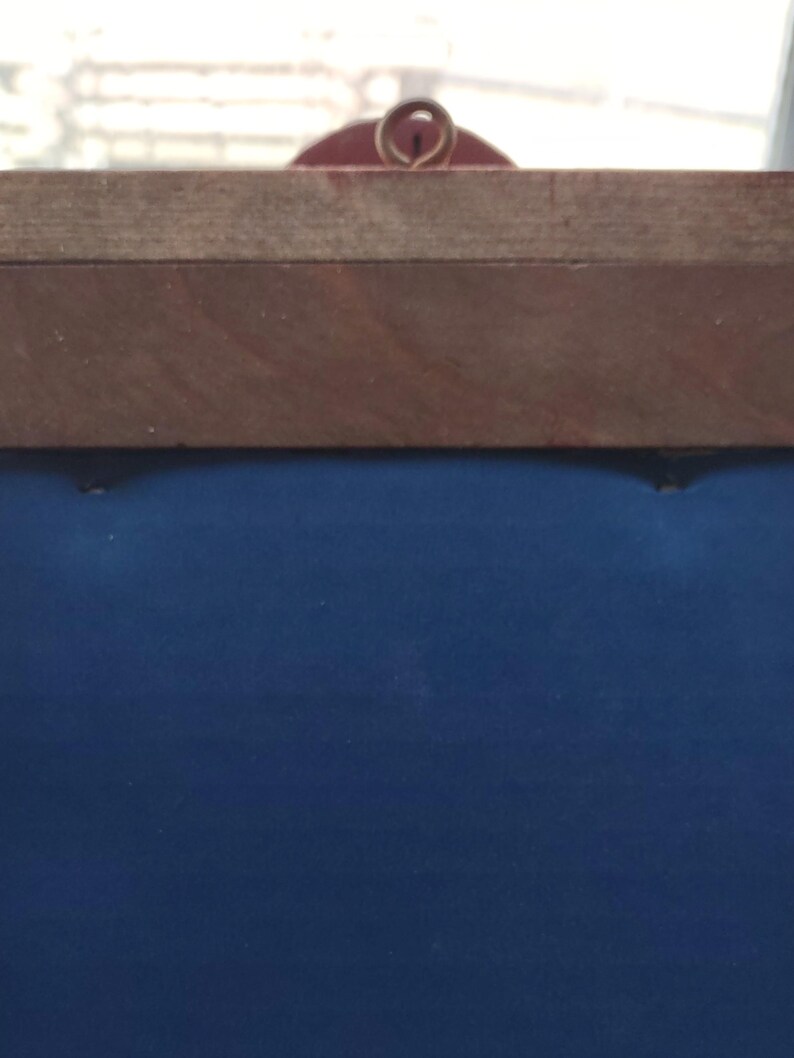 Display Shelf Painted in Old Carnivalesque Colors for the Display of