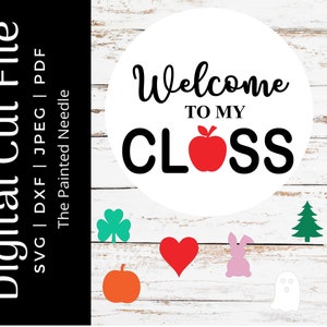 May include: A white circle with black text that says "Welcome to my Class" with a red apple in the middle of the word "Class".