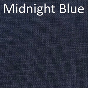 May include: A close-up of a dark blue fabric with a textured woven pattern. The fabric is labeled "Midnight Blue".