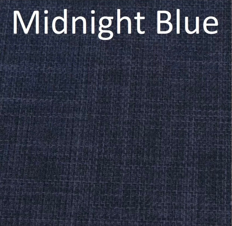 May include: A close-up of a dark blue fabric with a textured woven pattern. The fabric is labeled "Midnight Blue".