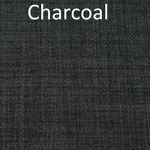 May include: Close-up of a charcoal gray fabric with a textured weave.