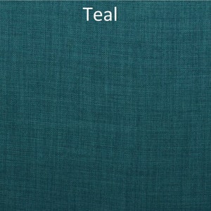 May include: Teal fabric with a woven texture.