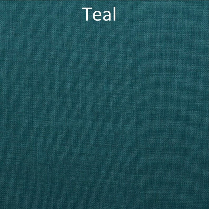May include: Teal fabric with a woven texture.