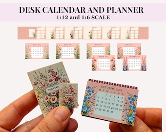 May include: Miniature desk calendar and planner set. The set includes calendars for several months, a planner, and a calendar for October 2025. The items are decorated with floral designs and the text "DESK CALENDAR AND PLANNER 1:12 and 1:6 SCALE".