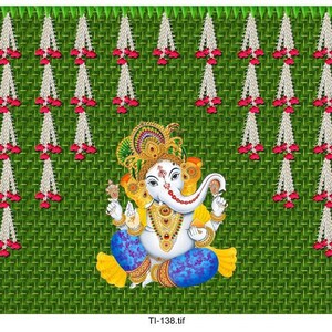 May include: A green and white floral garland with a depiction of the Hindu deity Ganesha in the center. The garland is made of woven leaves and has a traditional Indian design.