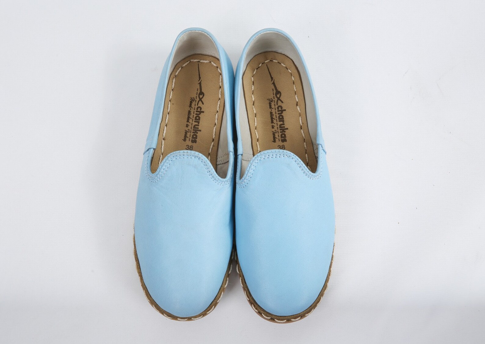 light blue slip ons