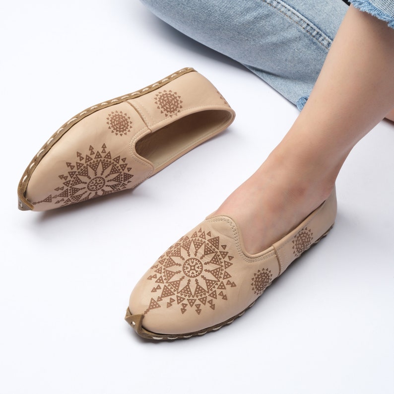 Modern black platform loafers for women, combining contemporary fashion with timeless comfort.