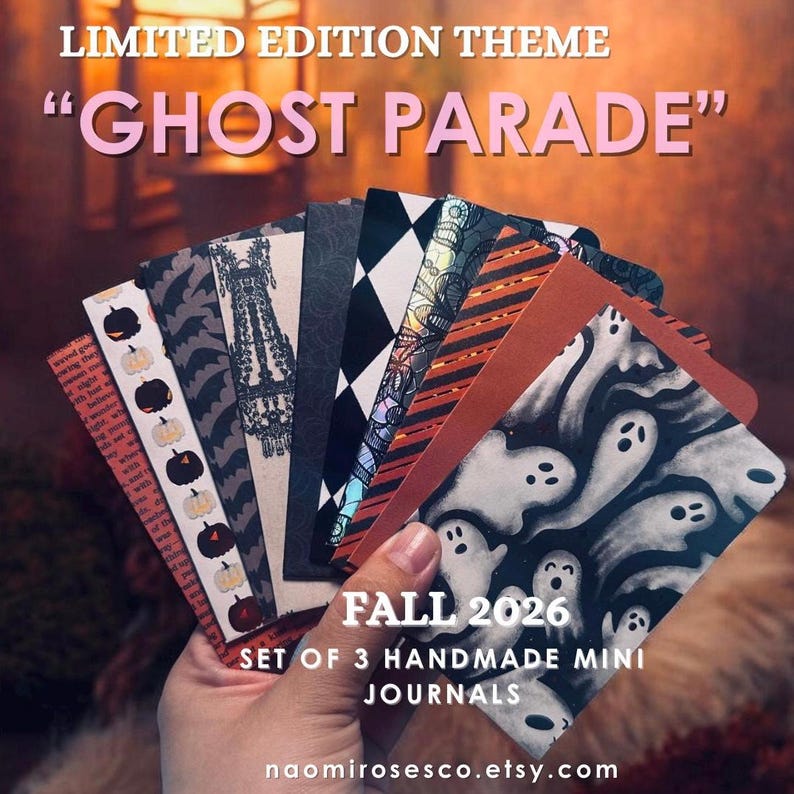 May include: A set of three handmade mini journals titled Ghost Parade Fall 2026. The journals feature various patterned covers including black and white ghosts, orange and black stripes, black diamonds, lace motifs, and pumpkin illustrations on paper.