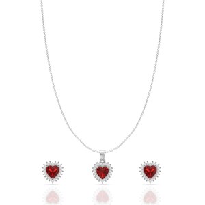 May include: A silver necklace and earring set with heart-shaped, red gemstones. The pendant and earrings have a halo of smaller, clear stones. The necklace chain and earring posts are silver.