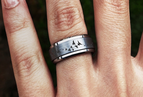 Engraved spinner hotsell ring
