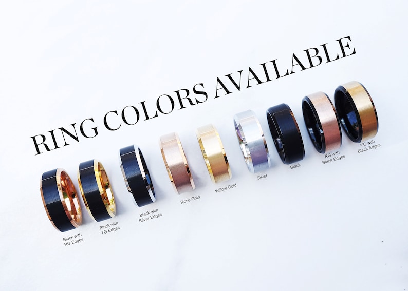 May include: A display of ten different colored rings with black edges. The rings are arranged in a row from left to right. The colors are black with rose gold edges, black with yellow gold edges, black with silver edges, rose gold, yellow gold, silver, black, rose gold with black edges, yellow gold with black edges.