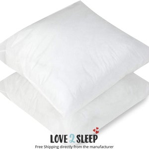 May include: Two white pillowcases, stacked on top of each other. The pillowcases are made of a soft, breathable fabric. Free Shipping directly from the manufacturer. LOVE 2 SLEEP.