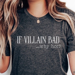 May include: A dark heather grey t-shirt with the text "IF VILLAIN BAD...why hot?" printed in white.