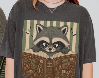 Raccoon reading Comfort colors shirt, Funny Raccoon Shirt, Book Lover Gifts, Fantasy Reading Tshirt, Smut Reader Gift, Raccoon Bookworm Tee