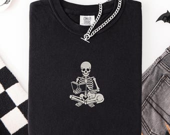Embroidered Skeleton Reading Comfort Colors Shirt, Halloween Skeleton tee, Skeleton Cat shirt, Spooky Book Lover Gift, Halloween Library Tee