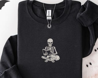 Embroidered Skeleton Reading Sweatshirt, Skeleton Book Sweatshirt, Halloween Bookish Crewneck, Spooky Reader Gift, Halloween Cat Lover Gift