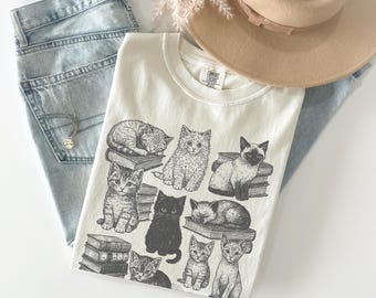 Camiseta con colores reconfortantes para gatos y libros, ideal para amantes de los libros, ideal para ratones de biblioteca, ideal para amantes de los gatos, ideal para amantes de los libros, ideal para mamás de gatos, ideal para amantes de las mascotas.