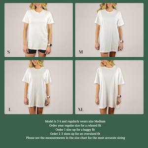 May include: A plain white short-sleeve t-shirt shown in four sizes labelled S, M, L, and XL. The text states the model is 5'4" and wears size Medium, advising to order regular size for relaxed fit, one size up for baggy, or 2-3 sizes for oversized.