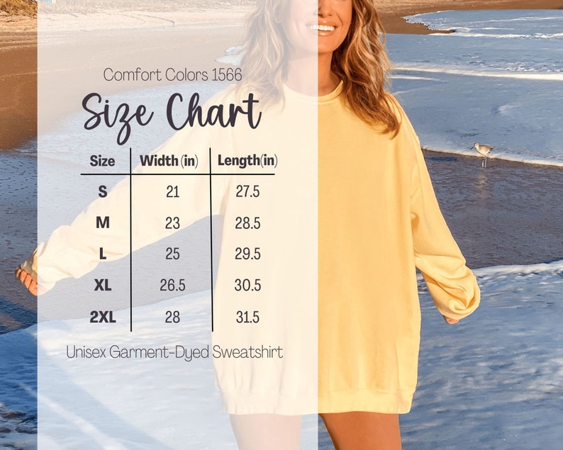 May include: Size chart for a unisex garment-dyed sweatshirt. The chart shows the width and length in inches for sizes S, M, L, XL, and 2XL.