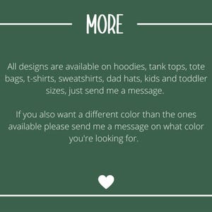 May include: Green background with white text that reads "MORE". The text below states that designs are available on hoodies, tank tops, tote bags, t-shirts, sweatshirts, dad hats, and kids and toddler sizes. A white heart is at the bottom.