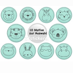 May include: Ten different animal face designs on round stickers. The stickers are light blue with black outlines. The animals include a bear, lion, zebra, fox, tiger, koala, owl, rabbit, frog, and hippo.