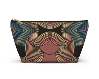 May include: A zipped pouch with a colourful, abstract design. The pattern features a symmetrical arrangement of curved lines in shades of blue, orange, and yellow against a black background. The zip is gold-coloured.
