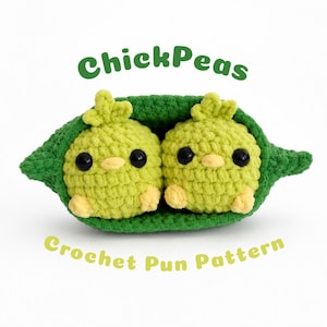 May include: A crochet amigurumi featuring two light green chick-like figures nestled inside a dark green pea pod. The figures have black bead eyes and small yellow beaks. The text ChickPeas and Crochet Pun Pattern is displayed in green.