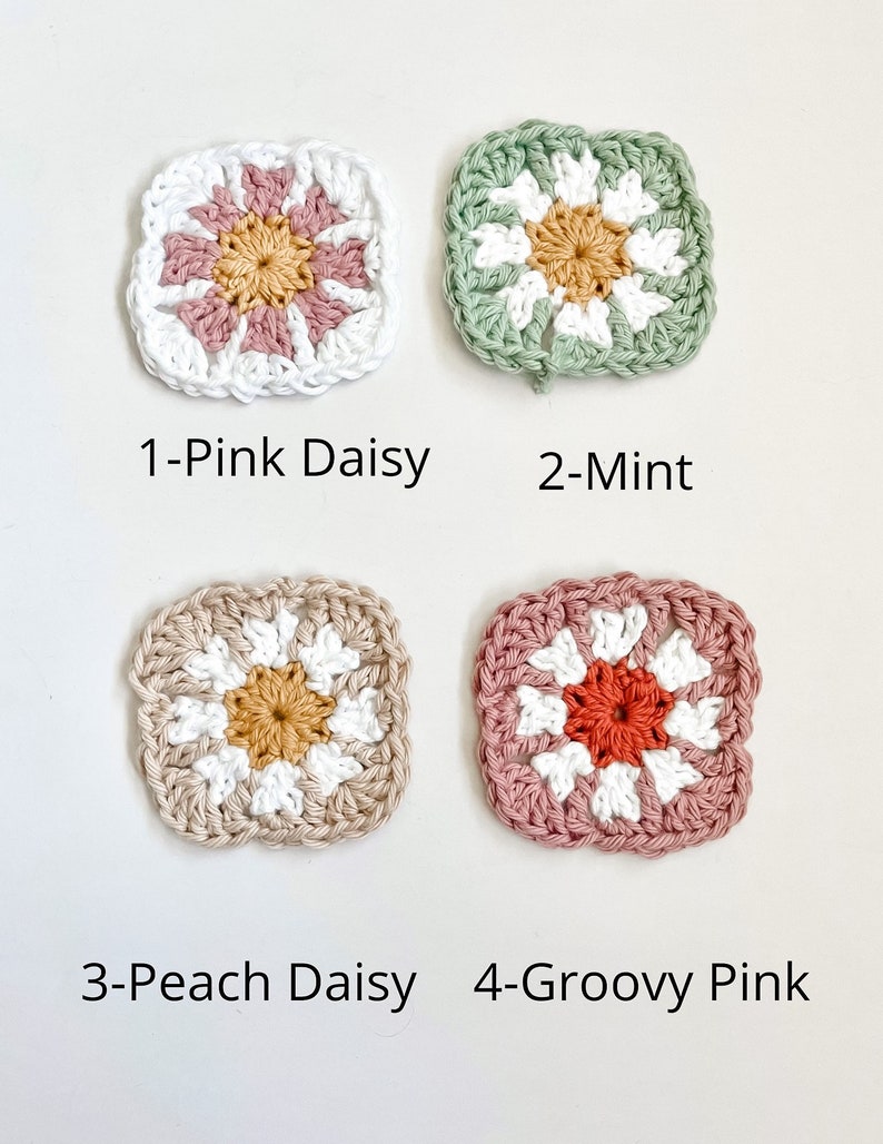 May include: Four crocheted squares with different colored flower designs. The squares are labeled 1-Pink Daisy, 2-Mint, 3-Peach Daisy, and 4-Groovy Pink.