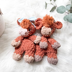 May include: A set of three ceramic nesting bowls in shades of blue, green, and white. The bowls feature a speckled glaze and a simple, modern design. The largest bowl measures approximately 6 inches in diameter.