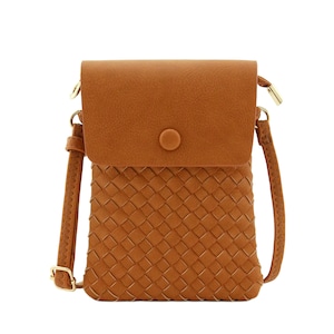 May include: A brown woven crossbody bag with a flap closure and a gold button. The bag has a long adjustable strap.