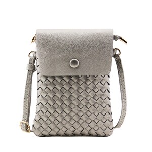 May include: A silver woven crossbody bag with a flap closure and a single button. The bag has a long adjustable strap.