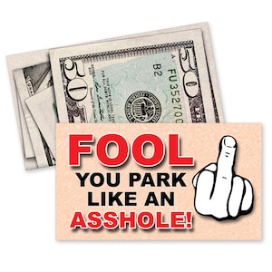 May include: A novelty sign with the text "FOOL YOU PARK LIKE AN ASSHOLE!" in red and black, with a white hand giving the middle finger. Several U.S. fifty-dollar bills are visible behind the sign.