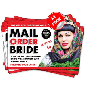 May include: A stack of 12 red and black postcards with the text "Mail Order Bride" and a picture of a woman wearing a headscarf. The text on the postcard says "She's all the "woman" you'll need!" and "Klamdyia".