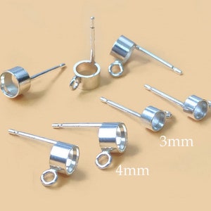 May include: Silver earring posts with loops, available in 3mm and 4mm sizes. The posts are designed for attaching earrings to.