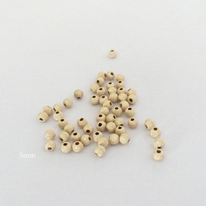 10個 3 mm 14K ゴールドフィルド スターダスト ラウンドビーズ、シームレスビーズ、米国製