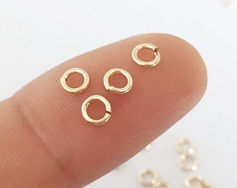 thumbnail interactive-video image 1 of 100 Gold Plated Open Jump Rings 4mm, 20 Gauge, Brass Metal For Jewelry Making 1 of 5