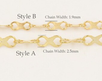 May include: Close-up of two gold-coloured chain styles, labelled A and B. Style A has a chain width of 2.5mm, while Style B is 1.9mm wide. The chains feature an infinity symbol design.