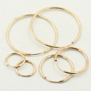 ピアス LESS IS MORE 14K gold field hoop earrings size 2 14kt Gold Hoop Earrings | Costco