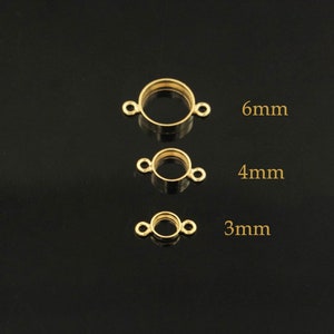 May include: Three gold-toned metal jump rings with a circular opening. The rings are 3mm, 4mm, and 6mm in diameter.