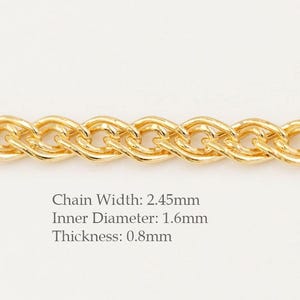 May include: Close-up of a gold-coloured chain with a wheat-link design. The chain width is 2.45mm, the inner diameter is 1.6mm, and the thickness is 0.8mm. The chain is displayed against a light background.