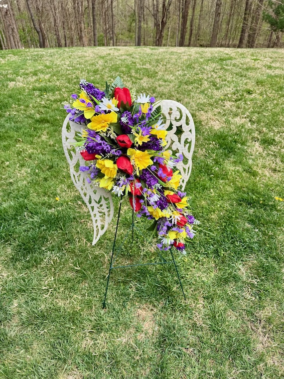 Multi-Color Silk Flowers on White Angel Wings Cemetery Arrangement