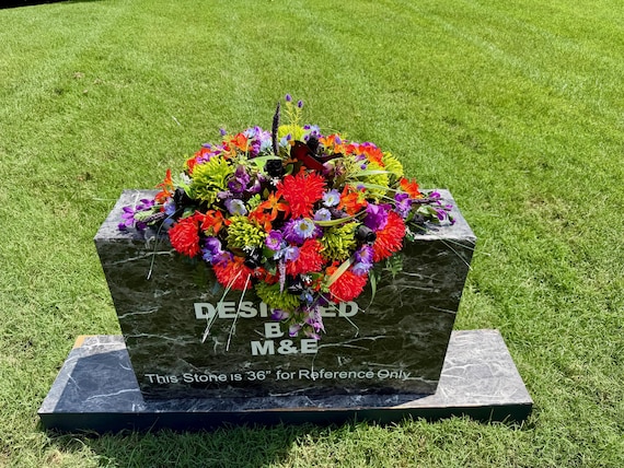 Bright Colors and a Blackbird in a Fall Cemetery Saddle: Quality Silk Memorial Flowers