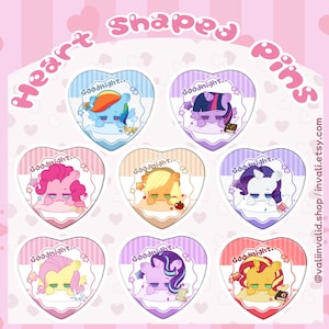 May include: Eight heart-shaped pins featuring My Little Pony characters. Each pin has a different pony sleeping on a pillow with a book or other object. The text "Goodnight..." is on each pin.